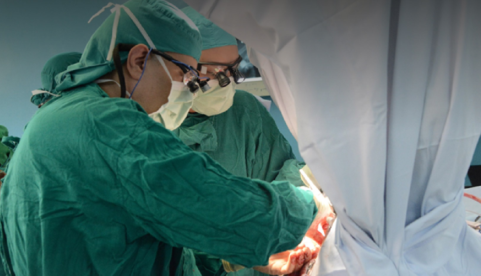 Former Fellow Dr. Justin Degrado and Dr. Hung Do operating together in Ho Chi Minh, City, Vietnam 